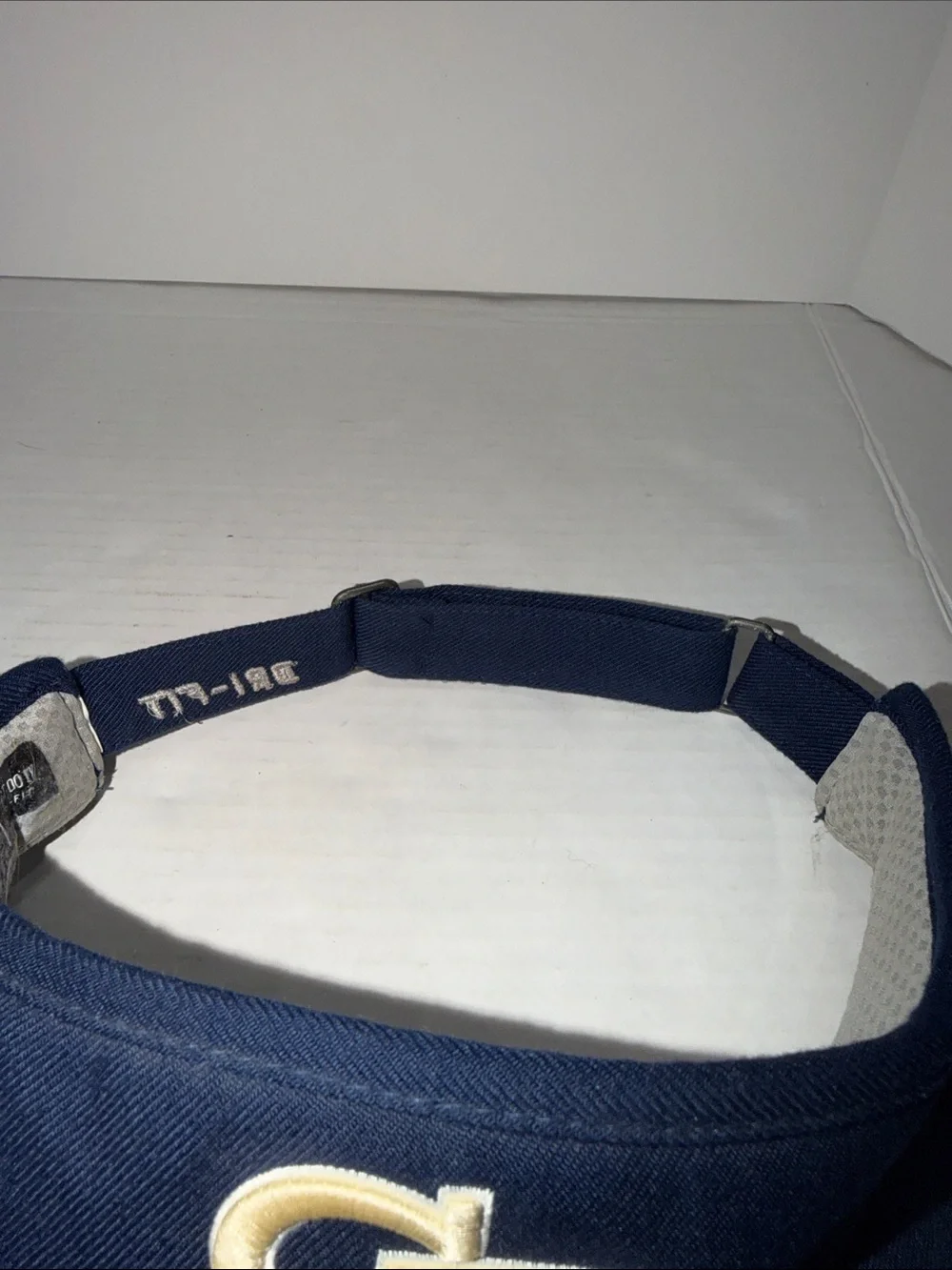 Nike Navy Visor with Gold GT Logo